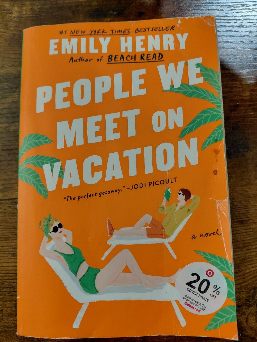 People We Meet on Vacation by Emily Henry - Bright Orange Paperback